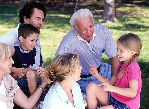 03f family with grandparents sitting in park