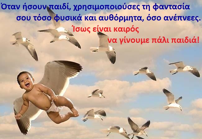 Low angle view of a baby boy flying