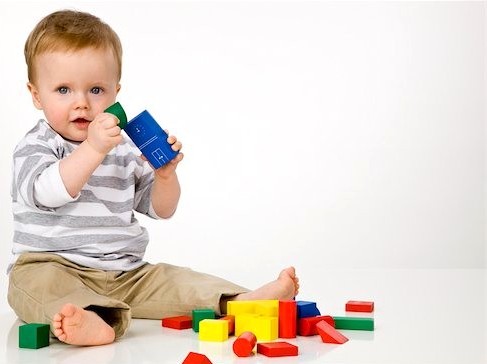 Baby Boy Playing with Blocks